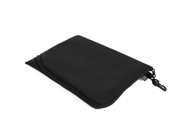 An A5 Ghost Whale Pouch in Black.